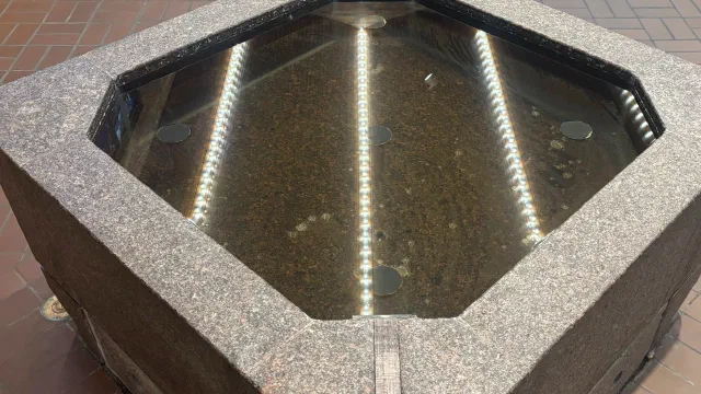 Why do baptismal fonts have eight sides?